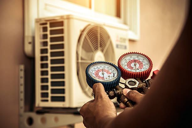 Professional Hvac Maintenance technician working in Indiantown, FL